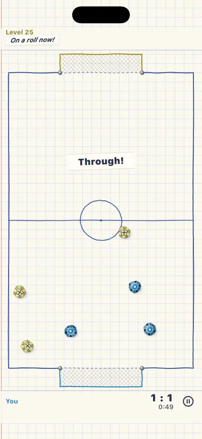The word Through! on the paper pitch after a ball has rolled through the gap.